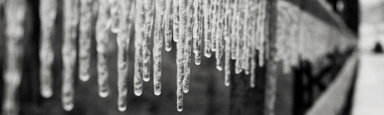 Icicles hanging from a gutter
